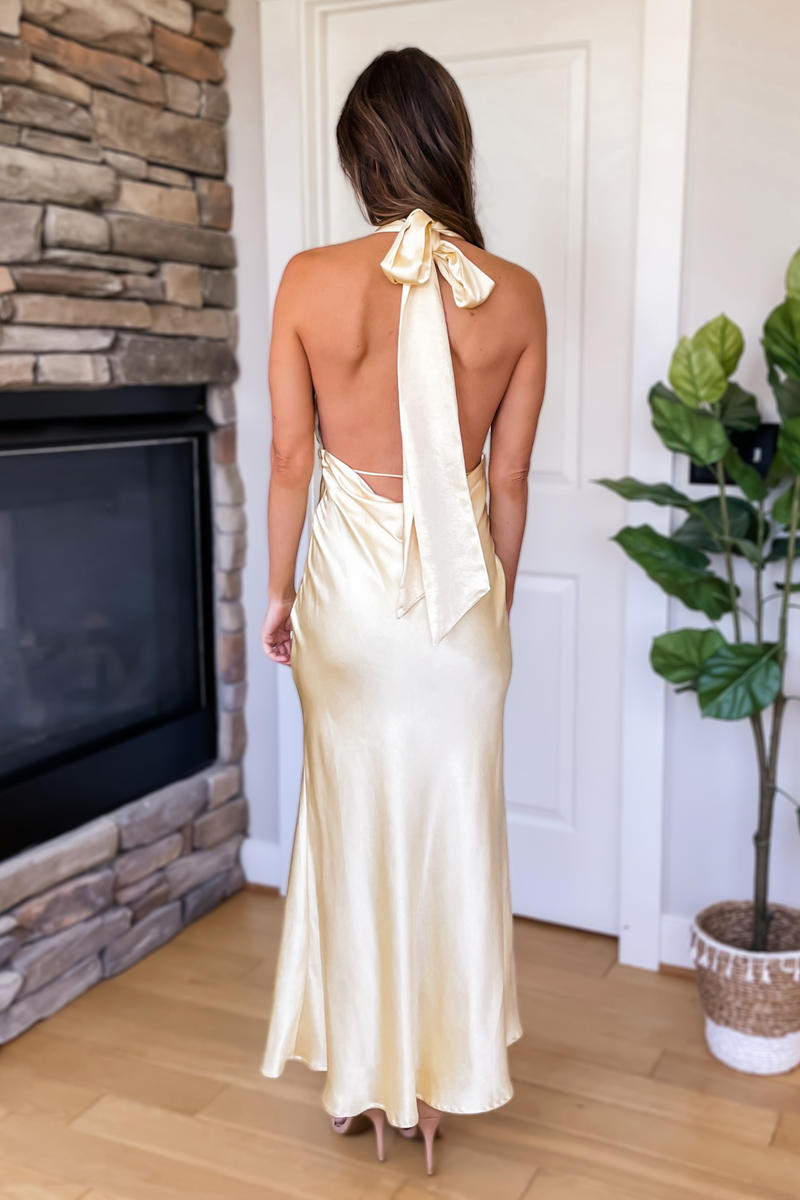 butter yellow halter dress ADELA MAXI | CULT MIA hip seam and paneling at the skirt for volume and movement Butter Yellow Maxi Dress